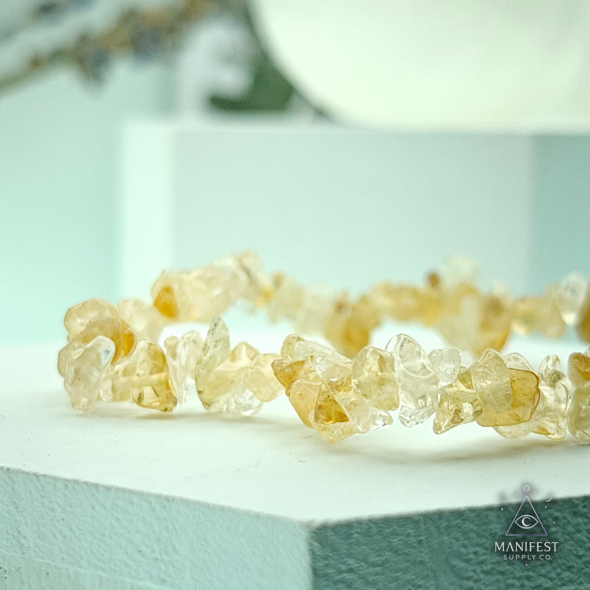 Citrine Chip Bracelet- Raw bracelet on a light background with 'Manifest Supply Co' branding.